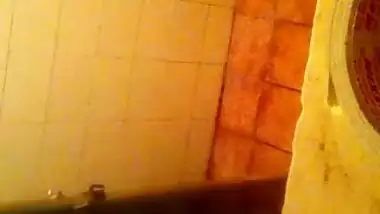 Girl spying on her stepmom having nude bath