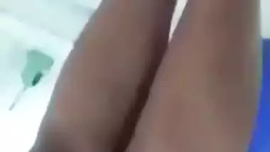 Beautiful desi girl lifting top to reveal sexy boobs