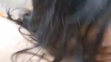 GF with smiling face gives blowjob to boyfriend