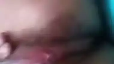 Super-horny Indian girl uses different things as a source of porn bliss