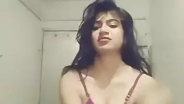 Indian teen unbuttons green shirt and takes it off just like her bra