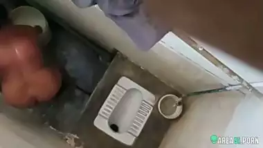 XXX clip of village aunty taking bath in outdoor taken on her son