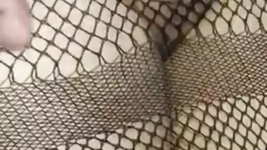 Hot Desi babe in fishnet dress has her pussy XXX rubbed by lover