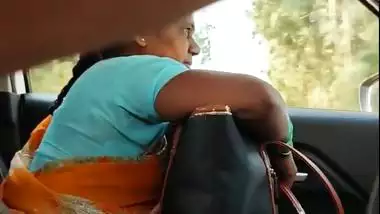 Man shows his dick to a milf in a moving van in Tamil porn