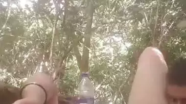 Mistress lets her servant lick her pussy during outdoor sex