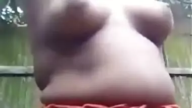 Desi takes outdoor shower and gets dressed in outdoor XXX self-tape