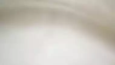 Indian holds a sex camera and touches her own XXX jugs and shaved slit