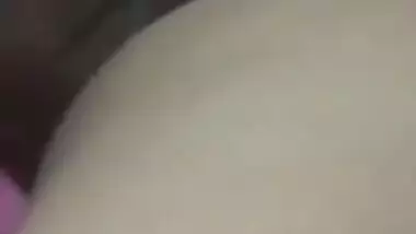 Relaxed Desi aunty lies on the bed with her sweet XXX vagina exposed