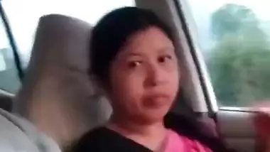 Cute Assamese wife blowjob to husband in running car